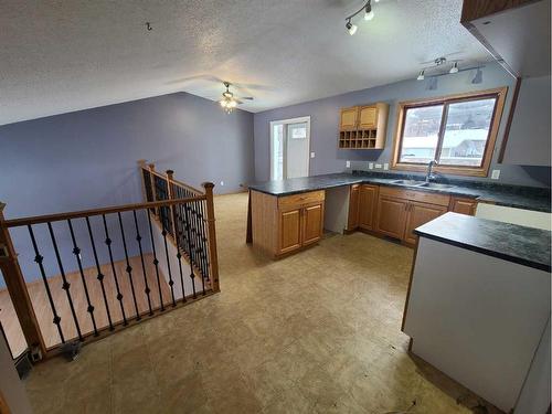 10918 92 Street, Peace River, AB - Indoor Photo Showing Kitchen With Double Sink