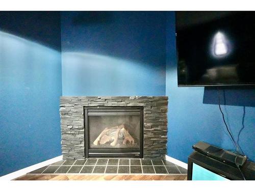 13002 91 Street, Peace River, AB - Indoor With Fireplace