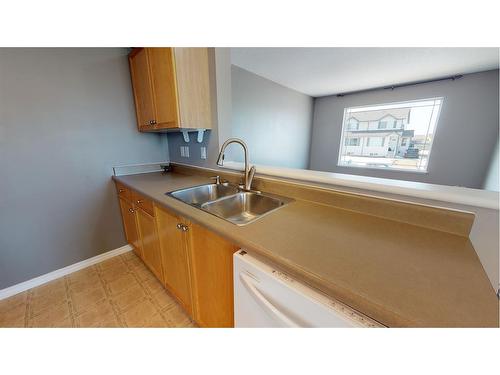 8221 114 Street, Grande Prairie, AB - Indoor Photo Showing Kitchen With Double Sink