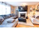 10229 70 Avenue, Grande Prairie, AB  - Indoor Photo Showing Living Room With Fireplace 