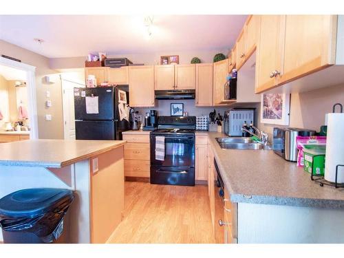 10229 70 Avenue, Grande Prairie, AB - Indoor Photo Showing Kitchen With Double Sink