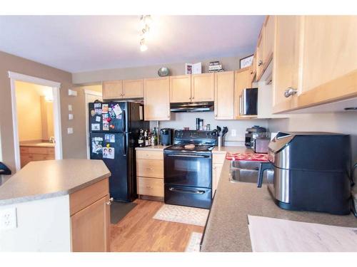 10326 70 Avenue, Grande Prairie, AB - Indoor Photo Showing Kitchen With Double Sink