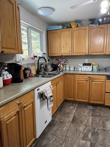 10918 97 Street, Grande Prairie, AB - Indoor Photo Showing Kitchen With Double Sink