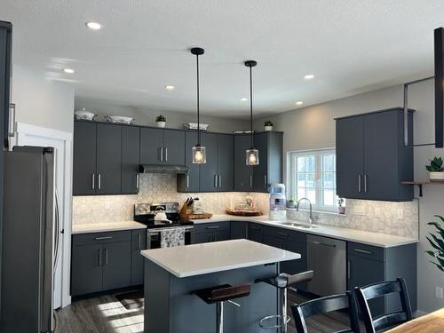 11-1049 Alberta Avenue, Debolt, AB - Indoor Photo Showing Kitchen With Upgraded Kitchen
