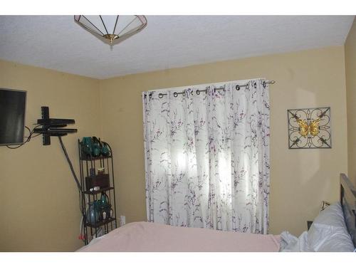 11301 100 Street, Fairview, AB - Indoor Photo Showing Bedroom