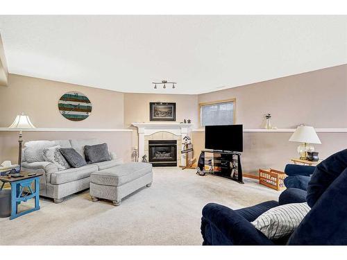 11724 89A Street, Grande Prairie, AB - Indoor Photo Showing Living Room With Fireplace