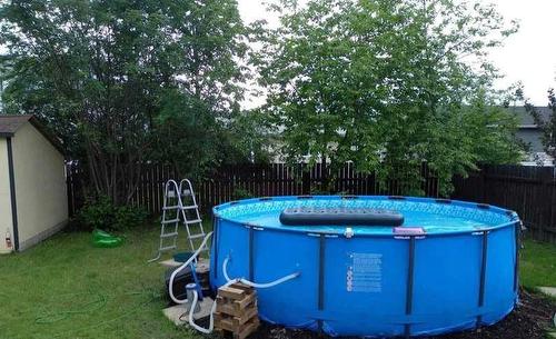 10710 103 Street, High Level, AB - Outdoor With Above Ground Pool