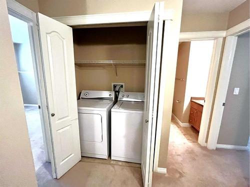 113-9105 91 Street, Grande Prairie, AB - Indoor Photo Showing Laundry Room
