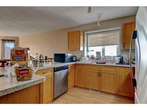 9222 & 9224 94A Avenue, Grande Prairie, AB - Indoor Photo Showing Kitchen With Double Sink