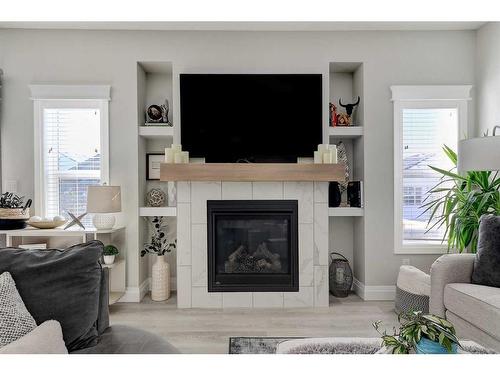 8645 121 Avenue, Grande Prairie, AB - Indoor Photo Showing Living Room With Fireplace
