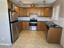 101-9105 91 Street, Grande Prairie, AB  - Indoor Photo Showing Kitchen With Double Sink 