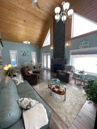 4 2Nd Avenue Se, Joussard, AB - Indoor Photo Showing Living Room With Fireplace