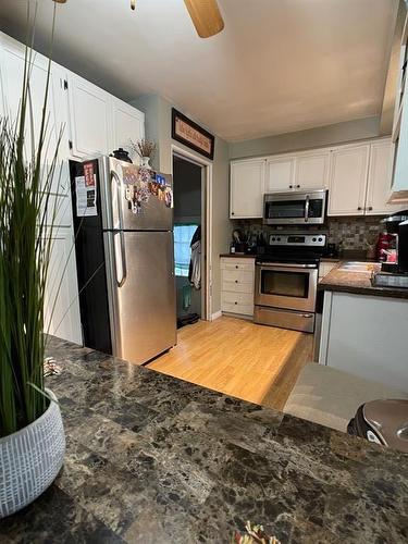 4721 55Th Avenue, High Prairie, AB - Indoor Photo Showing Kitchen With Double Sink