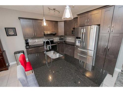 9455 Willow Drive, Grande Prairie, AB - Indoor Photo Showing Kitchen With Double Sink