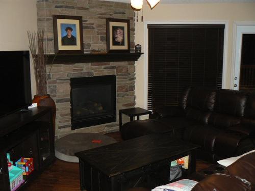 4449 Silverwood Crescent, High Prairie, AB - Indoor With Fireplace