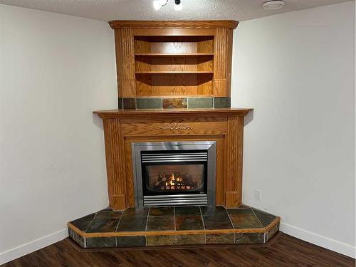 8206 105 Avenue, Peace River, AB - Indoor With Fireplace