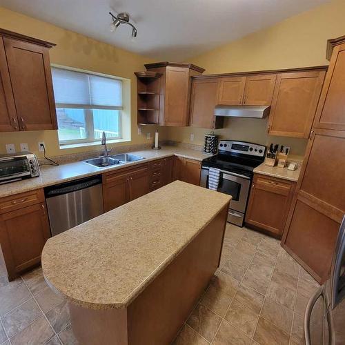 7013 99 Street, Peace River, AB - Indoor Photo Showing Kitchen With Double Sink