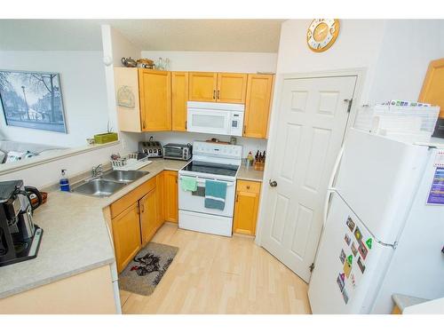 9429 129 Avenue, Grande Prairie, AB - Indoor Photo Showing Kitchen With Double Sink