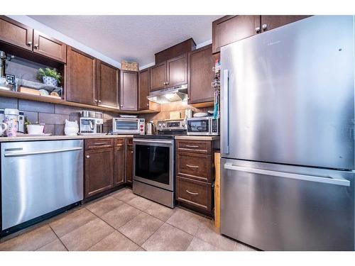 7029 113 Street, Grande Prairie, AB - Indoor Photo Showing Kitchen With Stainless Steel Kitchen