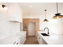 8221 87 Street, Grande Prairie, AB  - Indoor Photo Showing Kitchen With Double Sink 