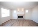 8222 87A Street, Grande Prairie, AB  - Indoor Photo Showing Living Room With Fireplace 