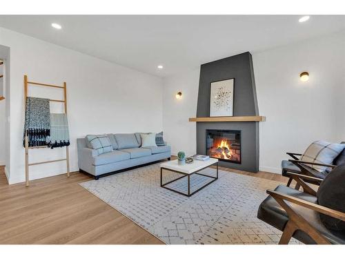 11434 107 Avenue, Grande Prairie, AB - Indoor Photo Showing Living Room With Fireplace