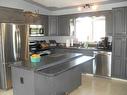 514 4Th Street Ne, Manning, AB  - Indoor Photo Showing Kitchen With Stainless Steel Kitchen With Double Sink 