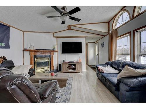 723014 & 723018 Range Road 110, Beaverlodge, AB - Indoor Photo Showing Living Room With Fireplace