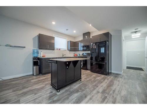 9067 80 Avenue, Grande Prairie, AB - Indoor Photo Showing Kitchen With Upgraded Kitchen