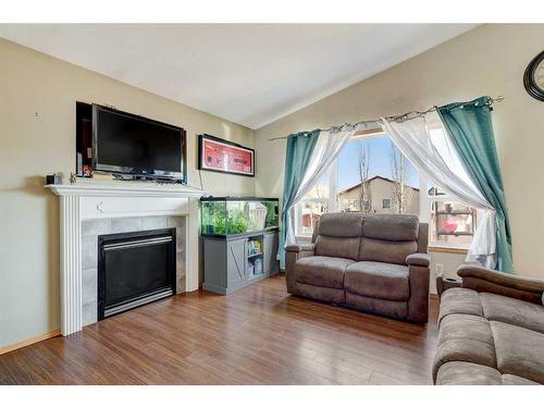13 Pinnacle Street, Grande Prairie, AB - Indoor Photo Showing Living Room With Fireplace