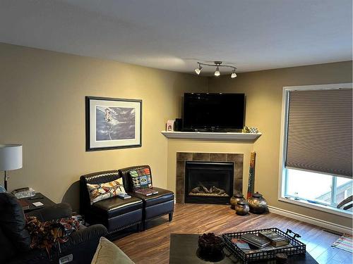 11226 71 Avenue, Grande Prairie, AB - Indoor Photo Showing Living Room With Fireplace
