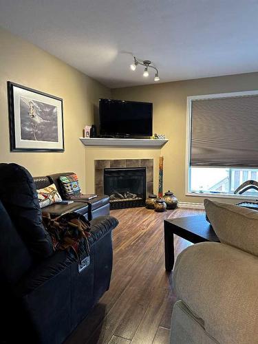 11226 71 Avenue, Grande Prairie, AB - Indoor Photo Showing Living Room With Fireplace