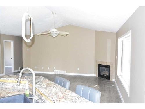 13605 92 Street, Peace River, AB - Indoor With Fireplace