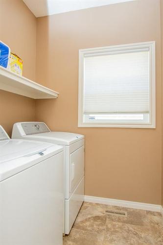 8833 73 Avenue, Grande Prairie, AB - Indoor Photo Showing Laundry Room