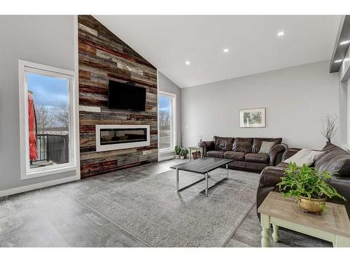 9205 Lakeshore Drive, Grande Prairie, AB - Indoor Photo Showing Living Room With Fireplace