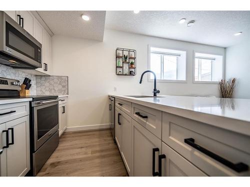12033 77 Avenue, Grande Prairie, AB - Indoor Photo Showing Kitchen With Upgraded Kitchen