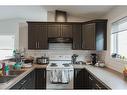 9615 113 Avenue, Clairmont, AB  - Indoor Photo Showing Kitchen With Double Sink 
