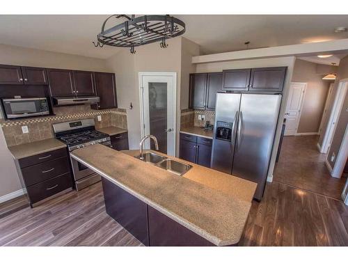11826 86A Street, Grande Prairie, AB - Indoor Photo Showing Kitchen With Double Sink