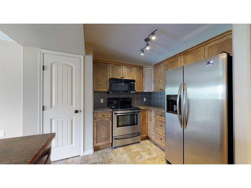 8642 62 Avenue, Grande Prairie, AB - Indoor Photo Showing Kitchen