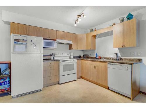 208-12015 Royal Oaks Drive, Grande Prairie, AB - Indoor Photo Showing Kitchen