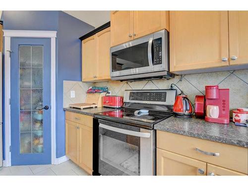 10905 67 Avenue, Grande Prairie, AB - Indoor Photo Showing Kitchen