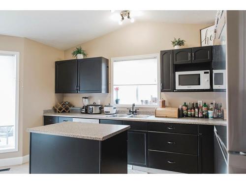 96 Pinnacle Way, Grande Prairie, AB - Indoor Photo Showing Kitchen With Double Sink