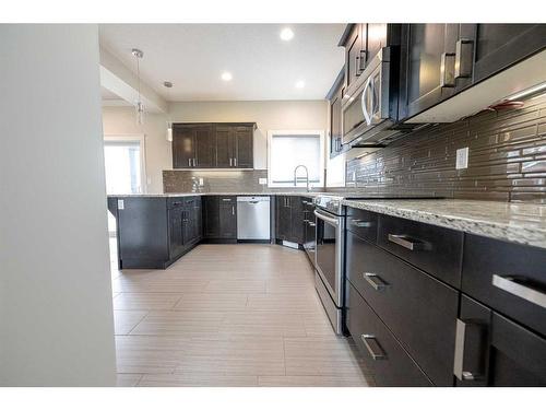 10206 124A Avenue, Grande Prairie, AB - Indoor Photo Showing Kitchen With Upgraded Kitchen