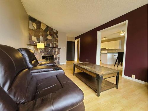 8005A 99 Street, Peace River, AB - Indoor With Fireplace
