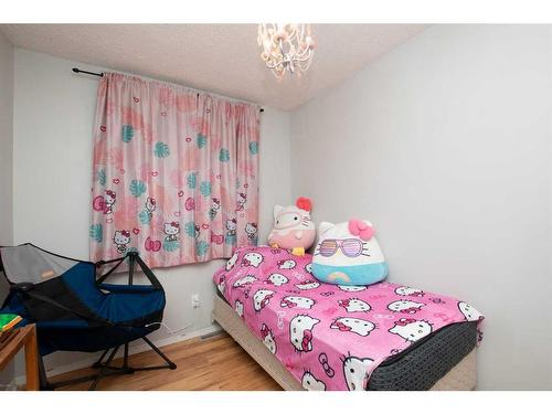 9313 101 Avenue, Grande Prairie, AB - Indoor Photo Showing Bedroom