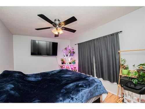 9313 101 Avenue, Grande Prairie, AB - Indoor Photo Showing Bedroom