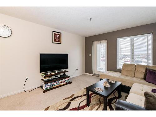 106-9810 96 Street, Grande Prairie, AB - Indoor Photo Showing Living Room
