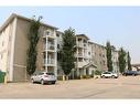 400-12025 Royal Oaks Drive, Grande Prairie, AB  - Outdoor With Balcony With Facade 