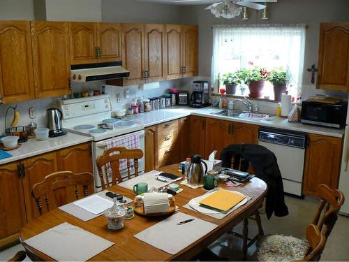 4844 57 Avenue, High Prairie, AB - Indoor Photo Showing Kitchen With Double Sink