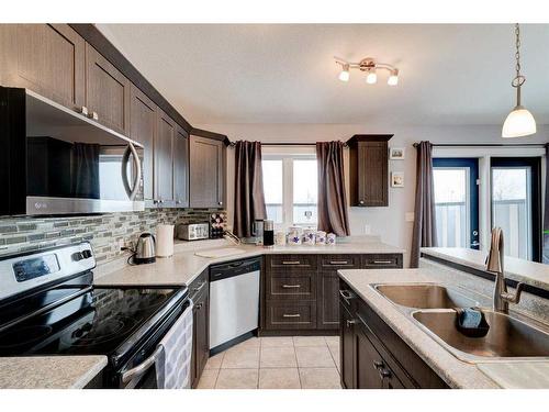 4801 45 Avenue, Spirit River, AB - Indoor Photo Showing Kitchen With Double Sink